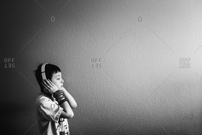 Boy listening to music with headphones