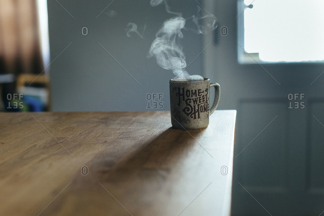 Steaming cup of coffee - Offset