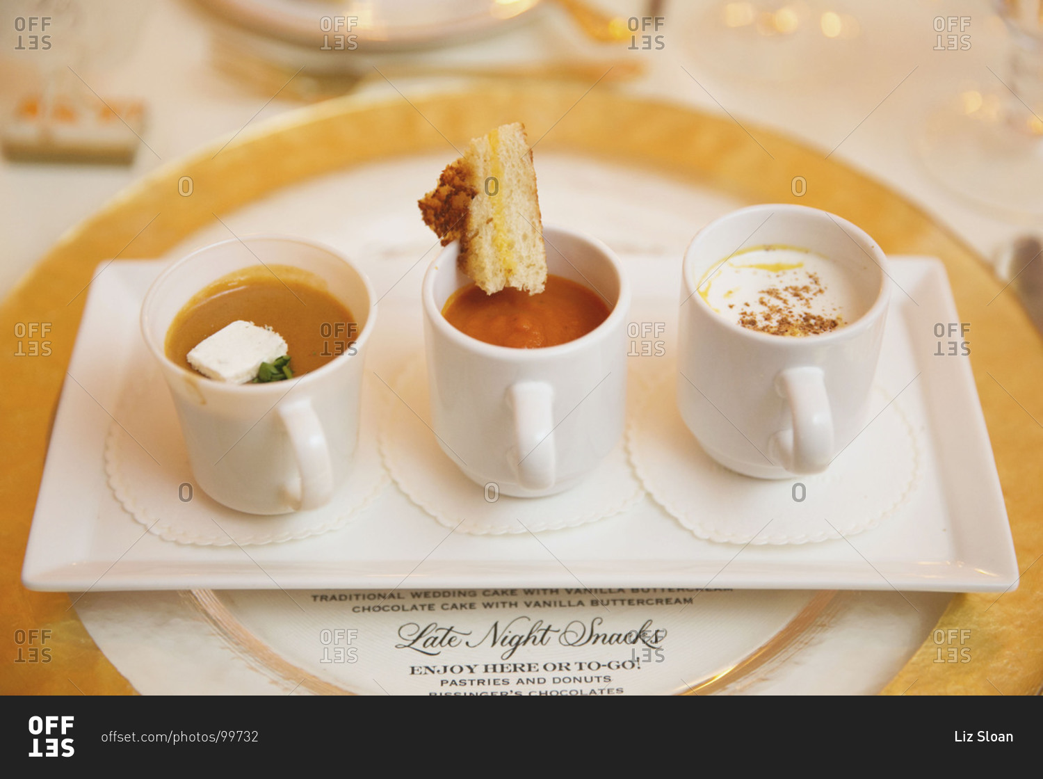 Three soups served in cups at wedding reception