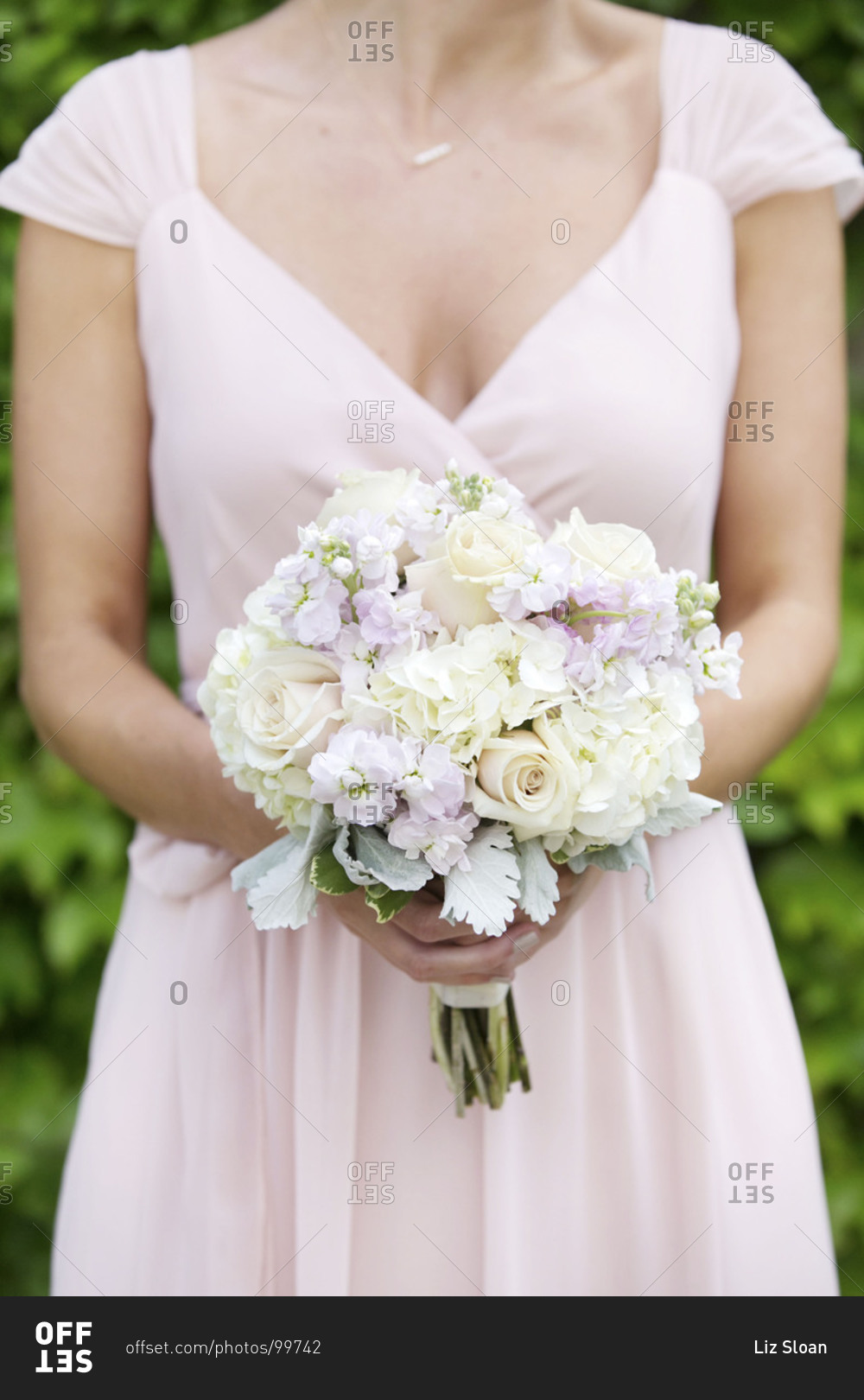 Bridesmaid holding a wedding bouquet