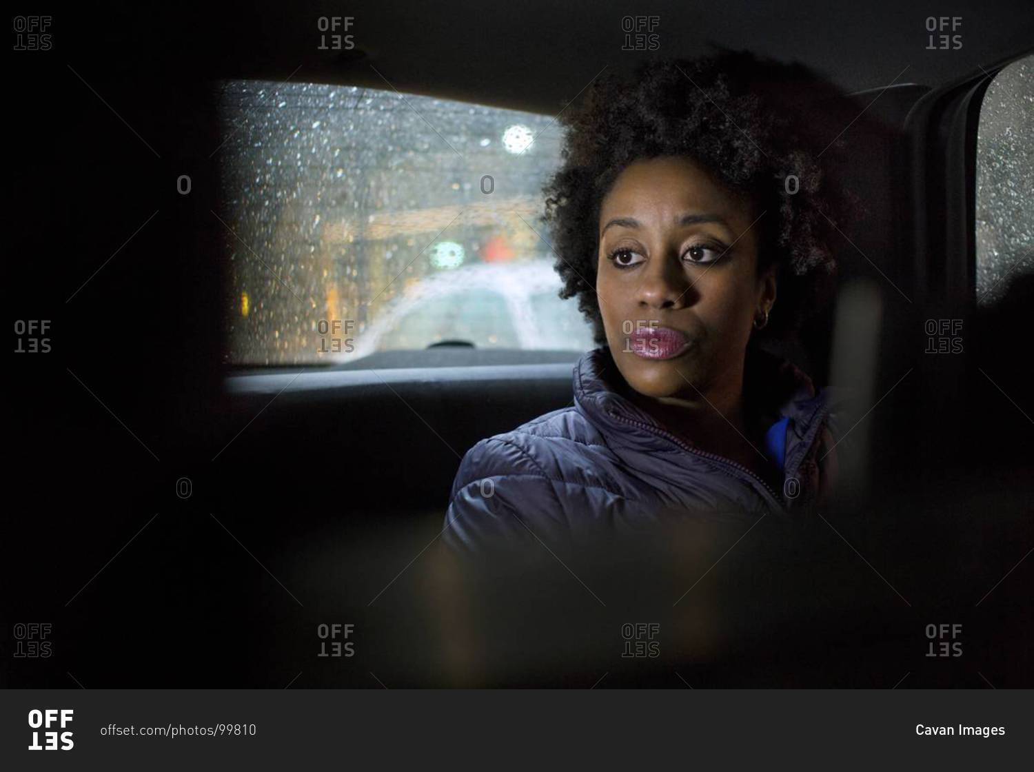 Woman traveling in a cab