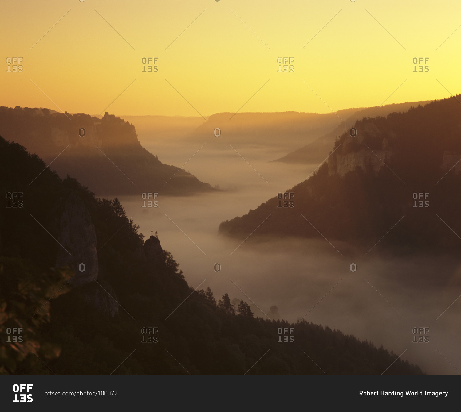 View from Eichfelsen Rock on Schloss Werenwag Castle and Danube Valley at sunrise, Upper Danube Nature Park, Swabian Alb, Baden Wurttemberg, Germany
