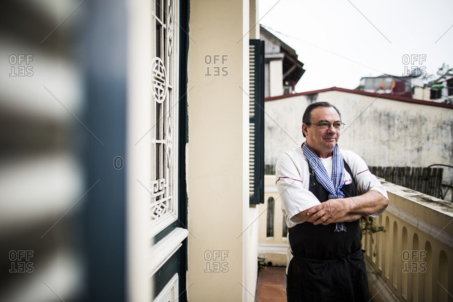 Hanoi, Vietnam - March 14, 2014: A portrait of chef Didier Corlou at his signature fine dining restaurant, La Vertical, in Hanoi, Vietnam.