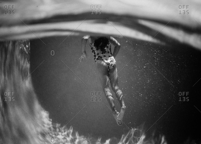 Girl swimming in a pool