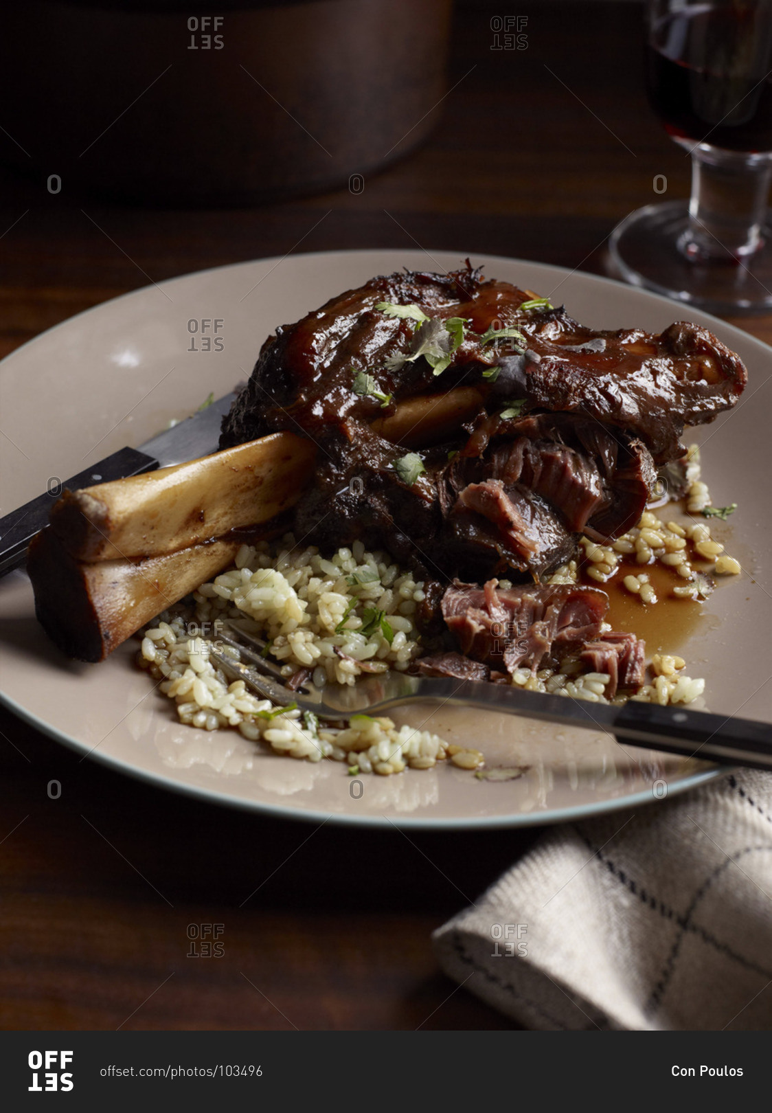 Braised wild boar shanks with sweet soy and star anise stock photo - OFFSET