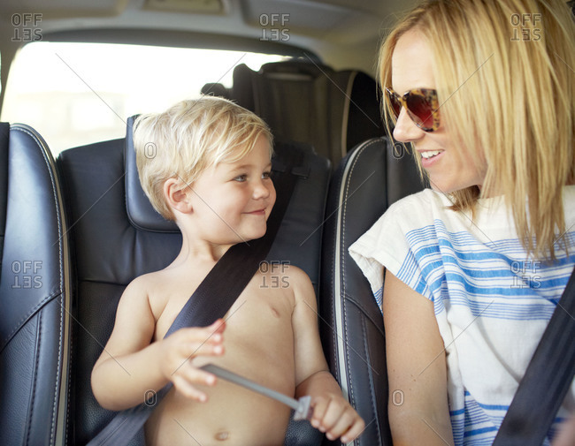 Mother and son traveling in a car