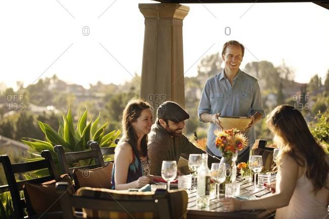 Group of friends having a dinner party