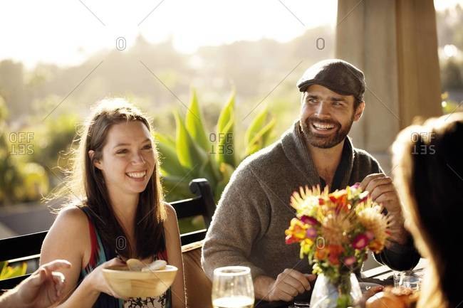 Couple sitting by a dinner table