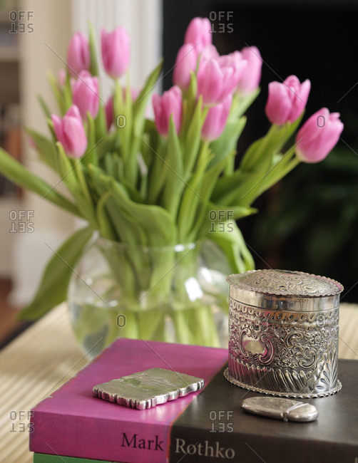 Pink tulips in round vase