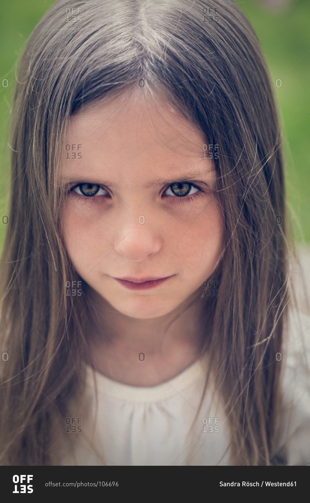 Portrait of sad little girl stock photo - OFFSET
