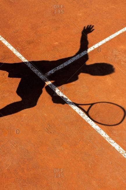 Shadow of a tennis player