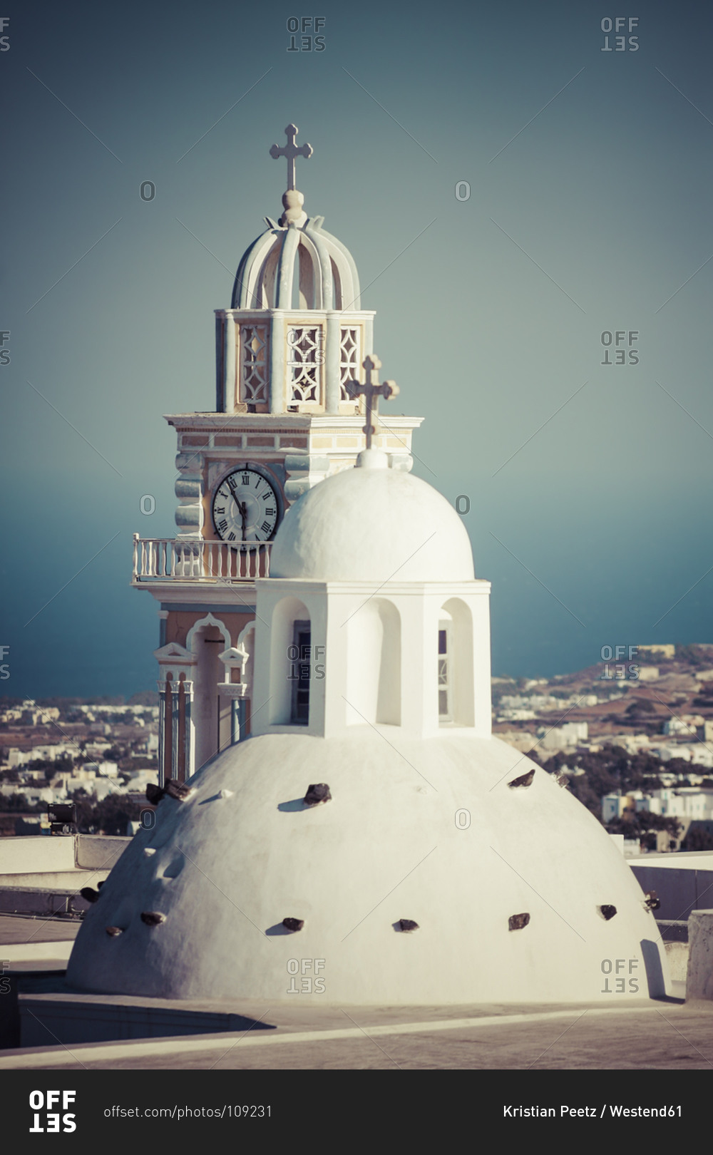 View to cupola and church spire of Holy church of John the Baptist, Thera, Santorini, Cyclades, Greece