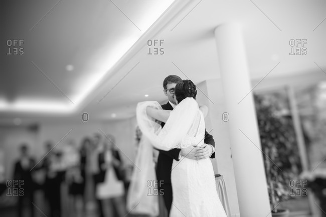 Newlyweds dancing at a wedding reception
