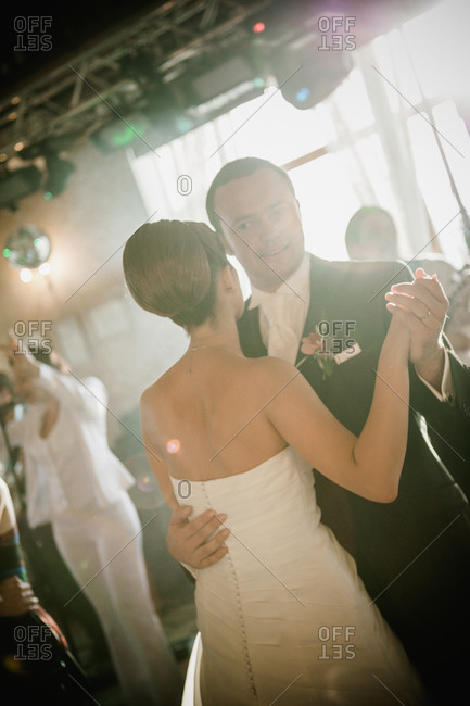 Newlyweds dancing at their wedding reception