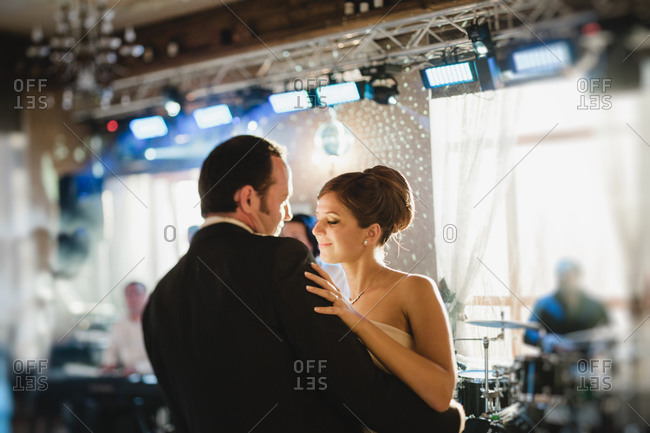 Bride and groom dancing at reception