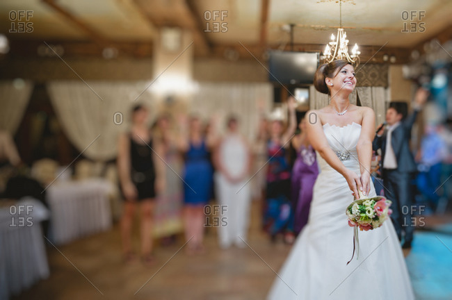 Bride throwing the bridal bouquet