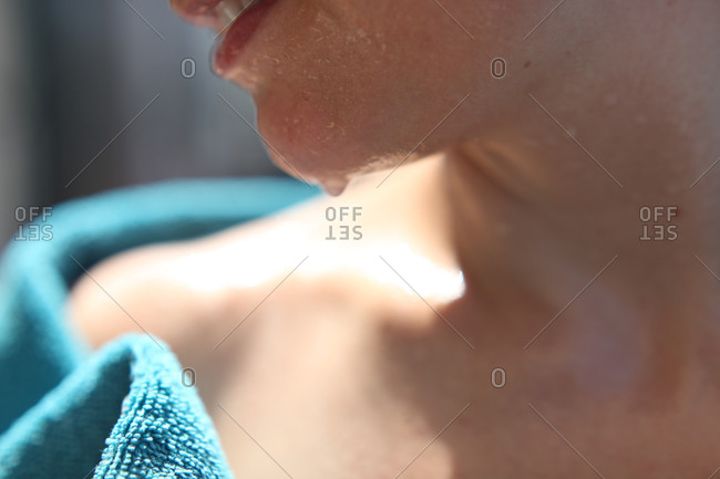 Close up of sweaty woman's cleavage stock photo - OFFSET
