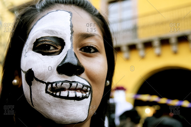 San Miguel de Allende, Mexico - October 31, 2008: Indigenous woman with face painting