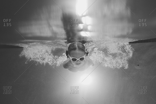 Boy diving into a pool