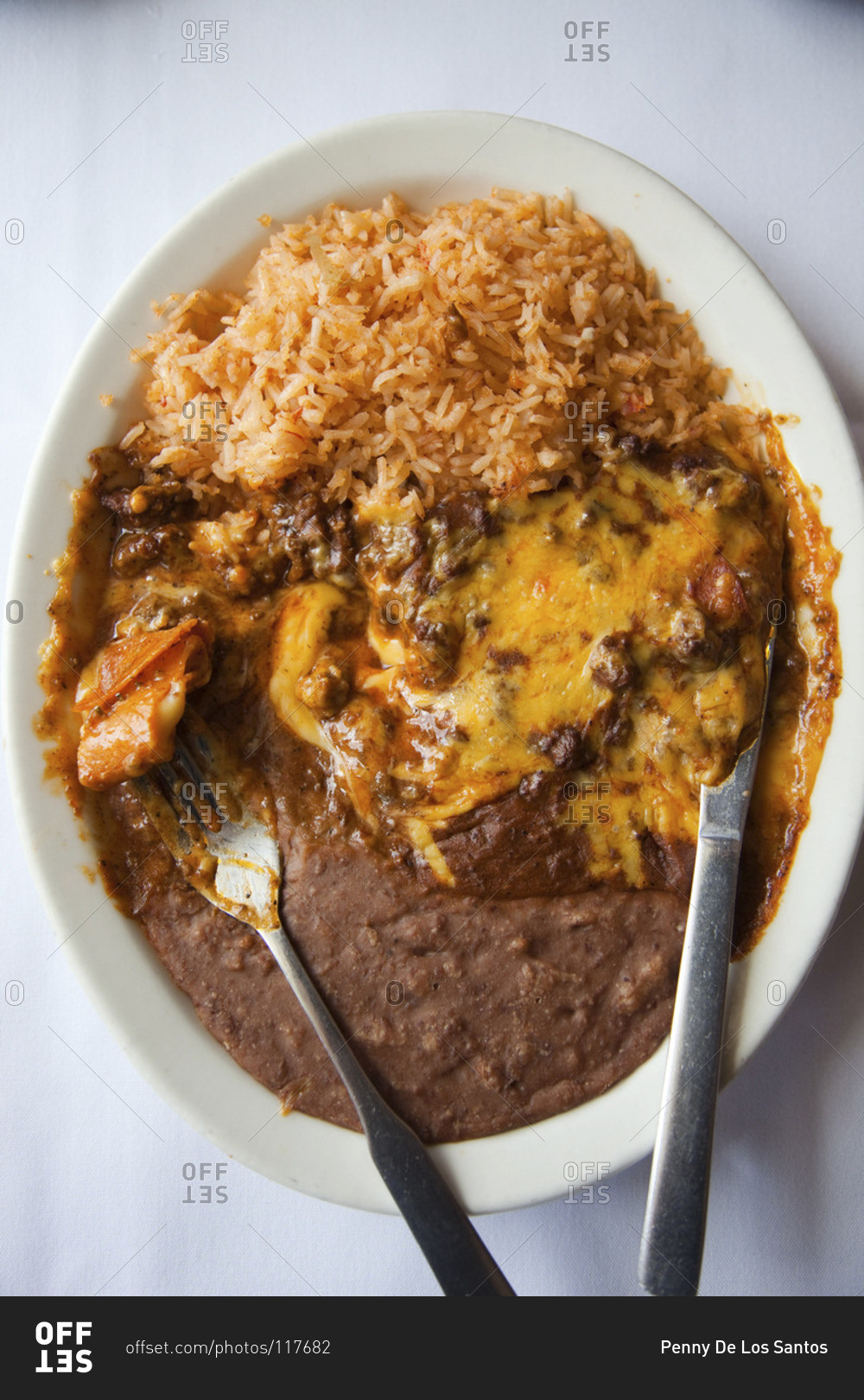 Typical Mexican cheesy dish made from rice and bean puree