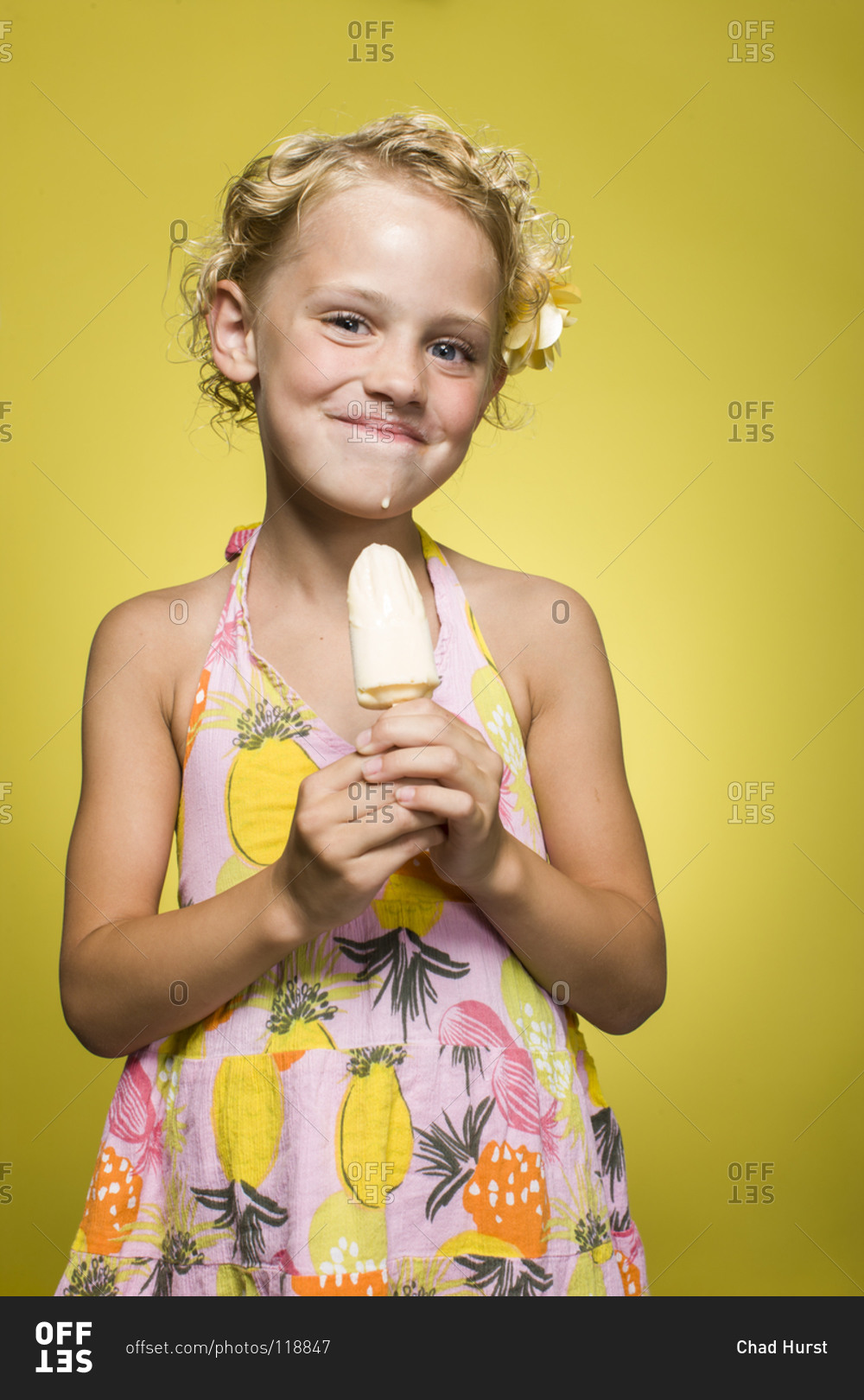 Girl standing with an ice cream bar