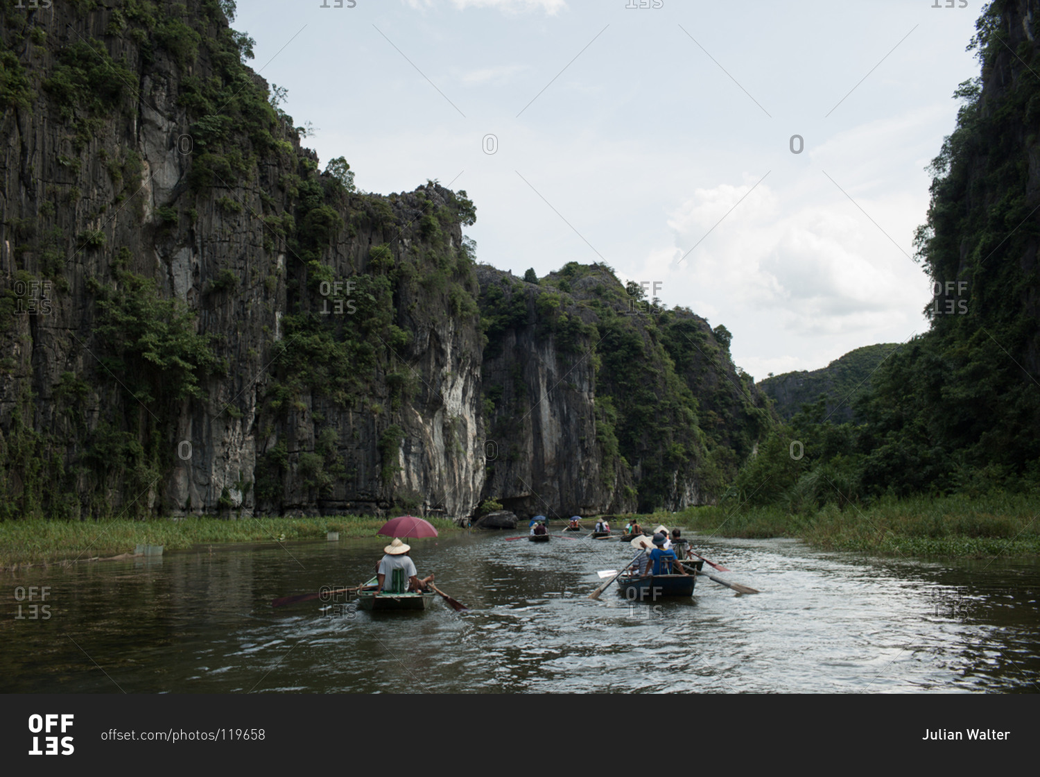 Tourists traveling by boat on a Vietnamese river