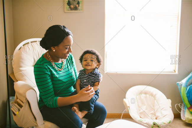 breastfeeding chair stock photos - OFFSET