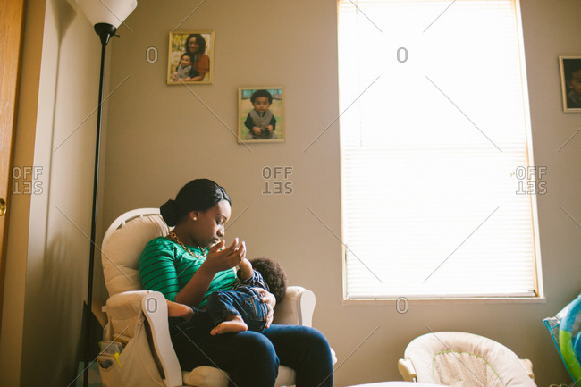 breastfeeding chair stock photos - OFFSET