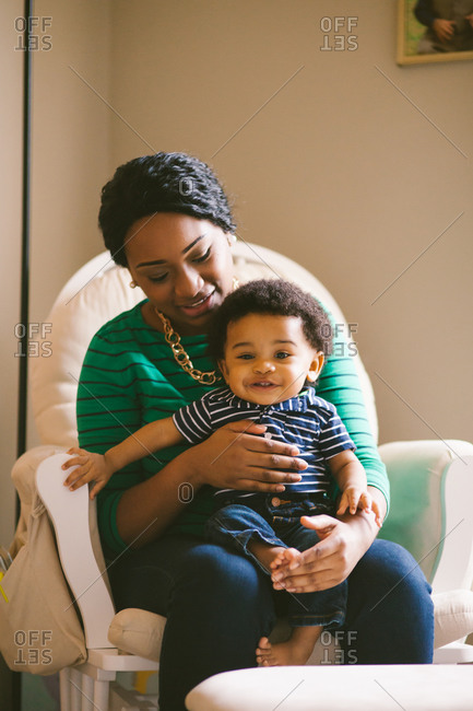 breastfeeding chair stock photos - OFFSET