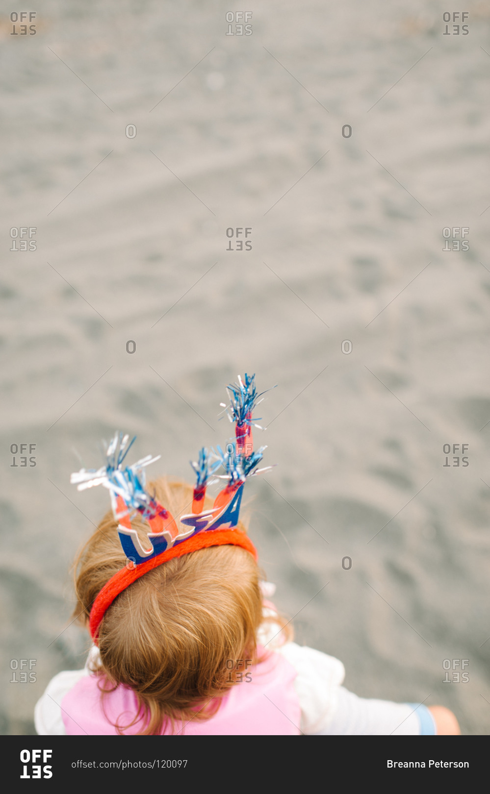 Overhead view of little girl wearing USA headband