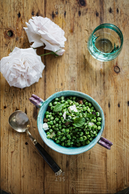 Pea saute with feta cheese and mint