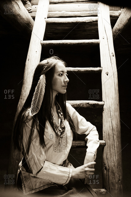 Young woman wearing Native American costume