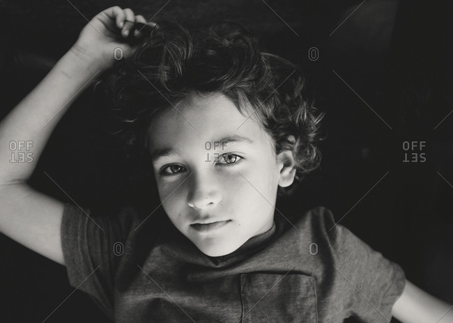 Black and white portrait of a little boy