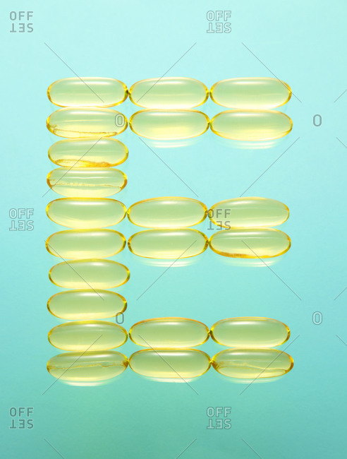 The letter E formed out of capsules