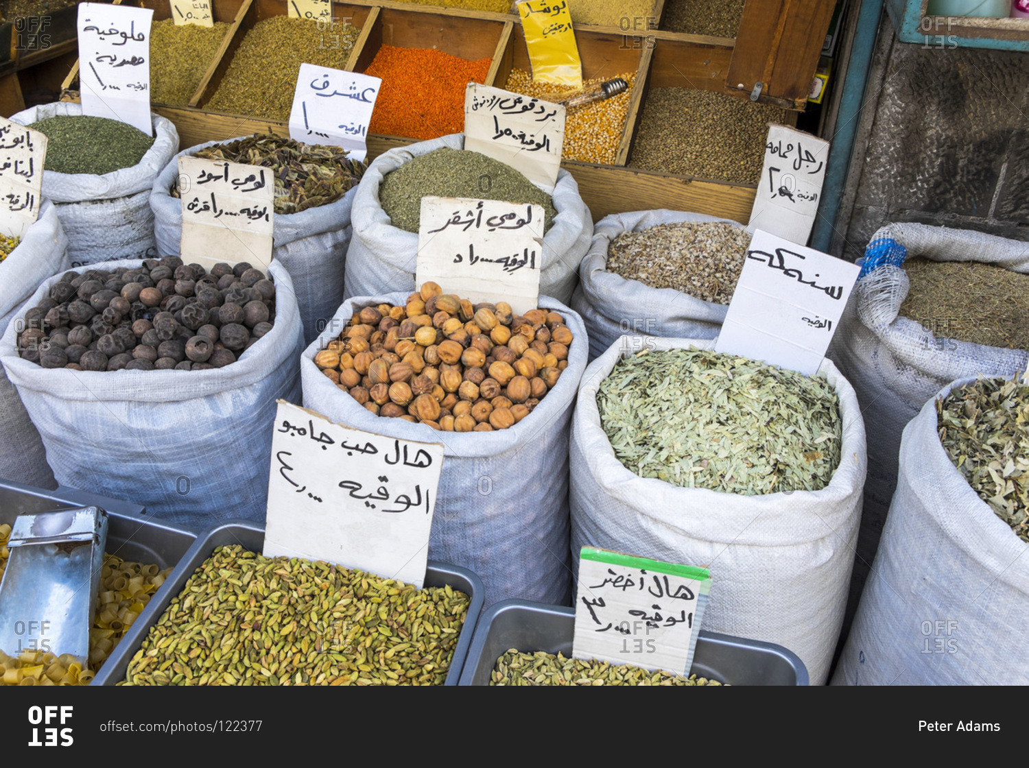 Arabic priced and labeled sacks of spices in a shop in Amman, Jordan