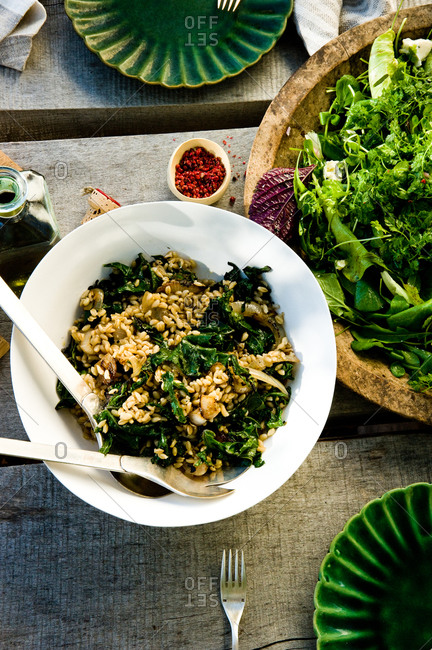 Wheat berries with kale served on a table