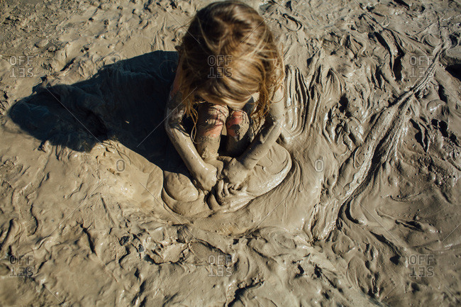 Little Girl Stuck In Mud