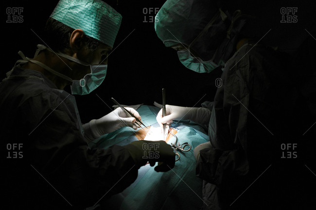Surgeons performing carotid artery surgery.