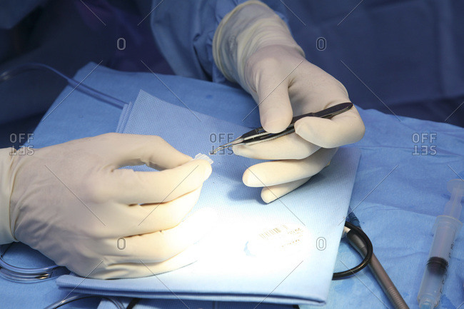 Ophthalmologic surgery. Out-patient surgical operation of the cataract. Preparation of the implant.