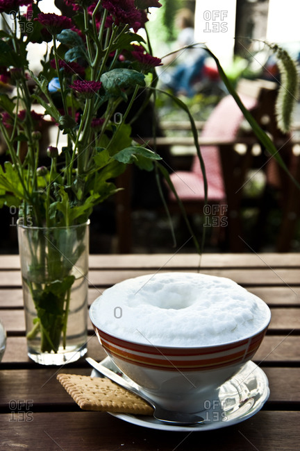 Cup of coffee served on a table