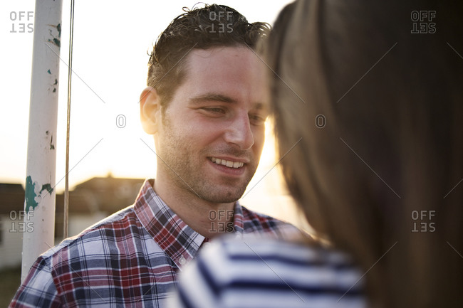 Portrait of a smiling man at sunset