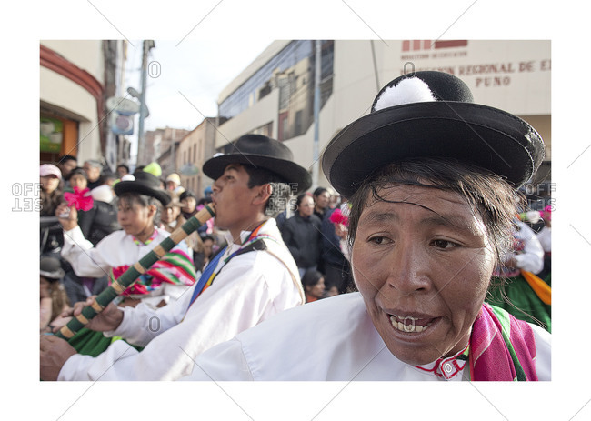 Puno, Peru - February 4, 2012:  Portrait of a woman on a street during the Virgin of Candelaria Feast