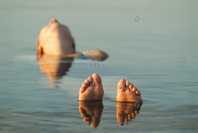 Woman swimming in lake - Offset