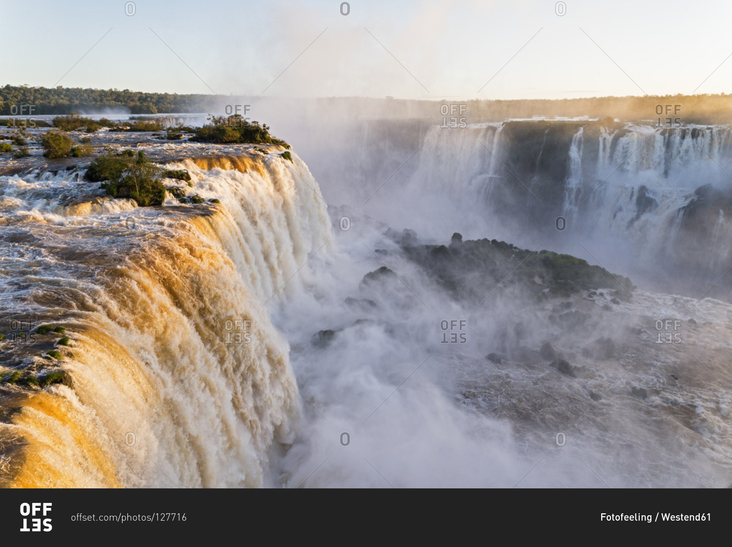 Iguazu Falls in the evening light stock photo OFFSET