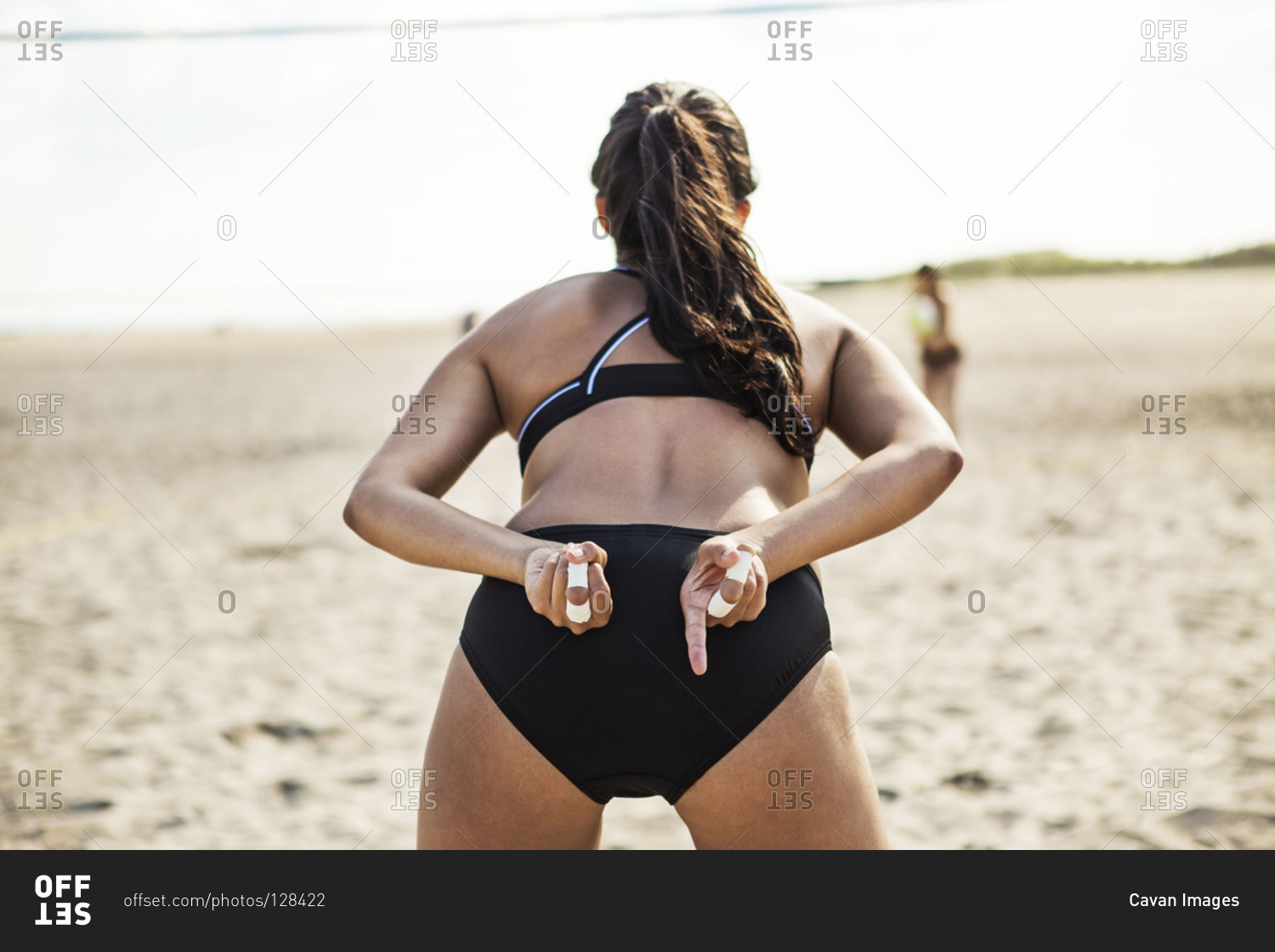 Beach volleyball player use hand signal