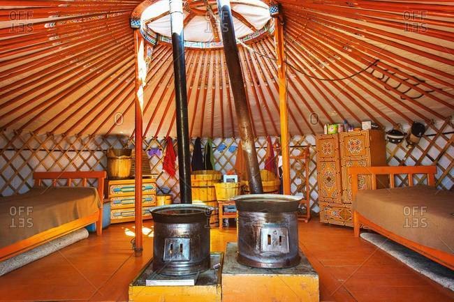 Mongolia - July 14, 2013: Beds inside a luxury yurt