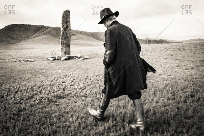 Man walking on field in Mongolia