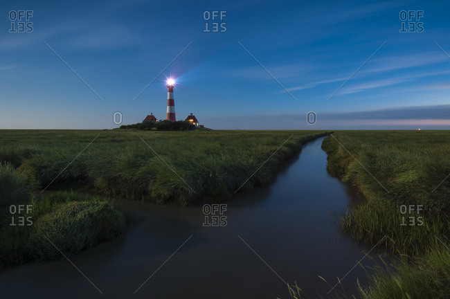 View of Westerheversand Lighthouse after sunset, Schleswig-Holstein, Germany