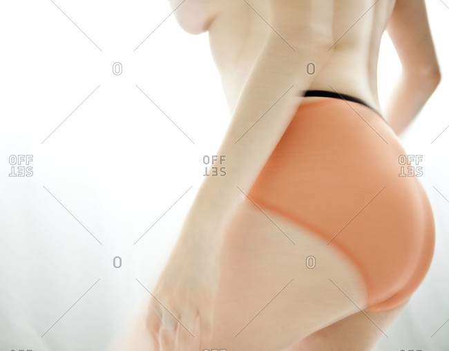 Four young men and women wearing underwear stock photo - OFFSET