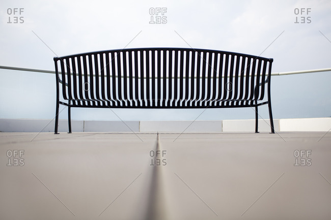 View of an empty bench on a terrace